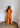 Ensemble femme orange en tissu fluide effet crêpe – tenue élégante et moderne