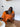 Ensemble femme orange en tissu fluide effet crêpe – tenue élégante et moderne